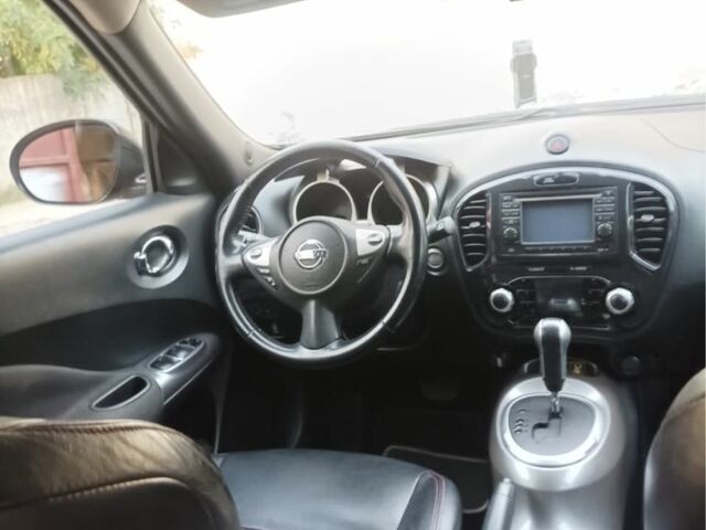 Черный Ниссан Жук, объемом двигателя 1.6 л и пробегом 160 тыс. км за 9150 $, фото 6 на Automoto.ua