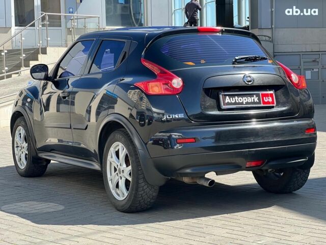 Черный Ниссан Жук, объемом двигателя 1.6 л и пробегом 115 тыс. км за 10030 $, фото 10 на Automoto.ua