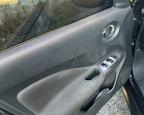 Черный Ниссан Жук, объемом двигателя 1.46 л и пробегом 158 тыс. км за 8250 $, фото 7 на Automoto.ua