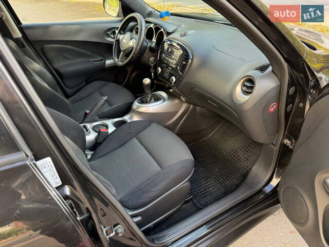 Черный Ниссан Жук, объемом двигателя 1.6 л и пробегом 187 тыс. км за 7900 $, фото 25 на Automoto.ua