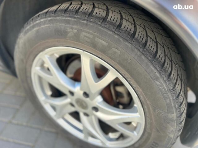 Черный Ниссан Жук, объемом двигателя 1.6 л и пробегом 115 тыс. км за 10030 $, фото 14 на Automoto.ua