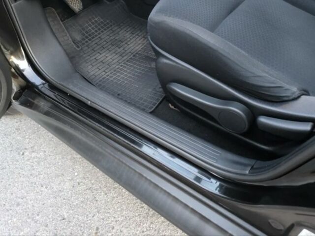 Черный Ниссан Жук, объемом двигателя 1.6 л и пробегом 153 тыс. км за 9500 $, фото 15 на Automoto.ua