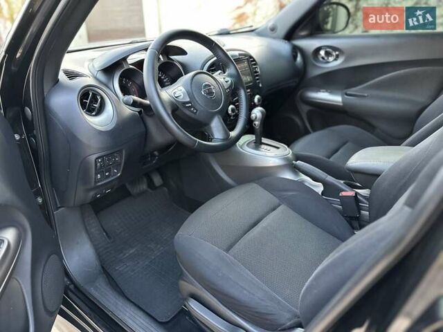 Черный Ниссан Жук, объемом двигателя 1.6 л и пробегом 117 тыс. км за 9900 $, фото 33 на Automoto.ua