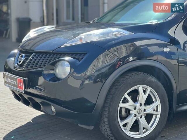 Черный Ниссан Жук, объемом двигателя 1.6 л и пробегом 115 тыс. км за 10030 $, фото 12 на Automoto.ua