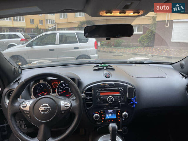 Черный Ниссан Жук, объемом двигателя 1.6 л и пробегом 270 тыс. км за 8500 $, фото 9 на Automoto.ua
