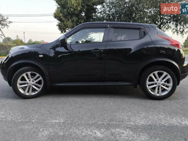 Черный Ниссан Жук, объемом двигателя 1.6 л и пробегом 153 тыс. км за 9500 $, фото 1 на Automoto.ua