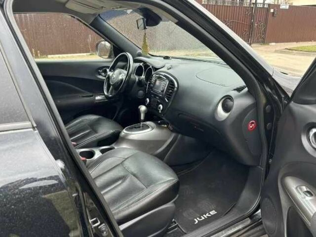 Черный Ниссан Жук, объемом двигателя 1.6 л и пробегом 115 тыс. км за 6500 $, фото 7 на Automoto.ua