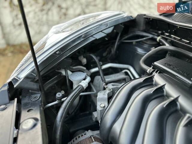 Черный Ниссан Жук, объемом двигателя 1.6 л и пробегом 117 тыс. км за 9900 $, фото 84 на Automoto.ua