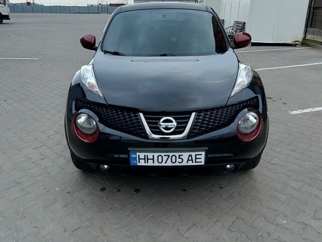 Черный Ниссан Жук, объемом двигателя 1.6 л и пробегом 124 тыс. км за 10700 $, фото 4 на Automoto.ua