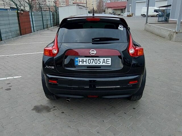 Черный Ниссан Жук, объемом двигателя 1.6 л и пробегом 124 тыс. км за 10700 $, фото 1 на Automoto.ua