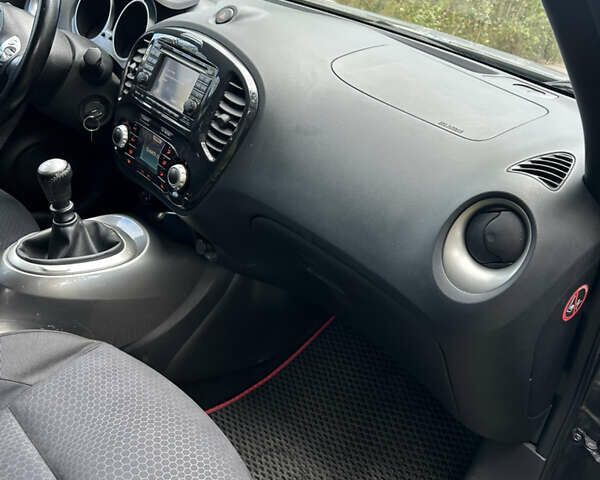 Черный Ниссан Жук, объемом двигателя 1.46 л и пробегом 160 тыс. км за 7550 $, фото 14 на Automoto.ua