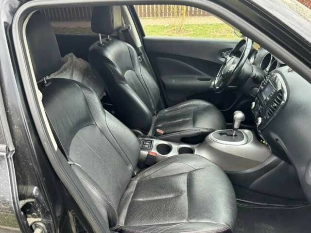 Черный Ниссан Жук, объемом двигателя 1.6 л и пробегом 115 тыс. км за 6500 $, фото 8 на Automoto.ua