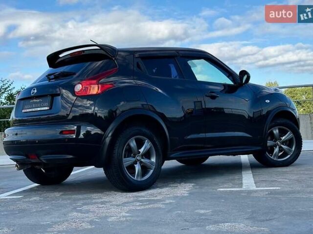 Чорний Ніссан Жук, об'ємом двигуна 1.6 л та пробігом 88 тис. км за 9700 $, фото 6 на Automoto.ua