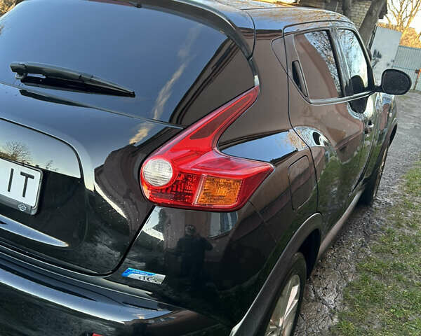 Черный Ниссан Жук, объемом двигателя 1.46 л и пробегом 158 тыс. км за 8250 $, фото 23 на Automoto.ua