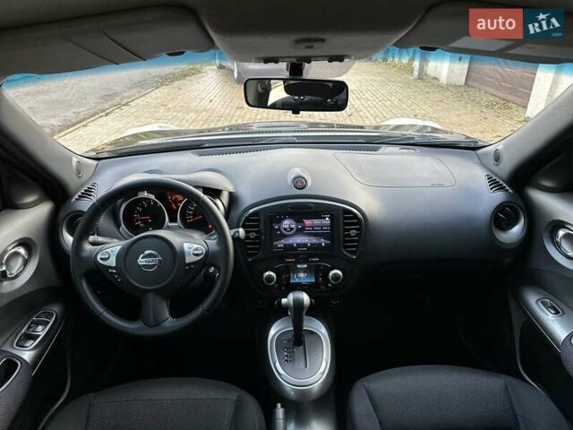 Черный Ниссан Жук, объемом двигателя 1.6 л и пробегом 117 тыс. км за 9900 $, фото 21 на Automoto.ua