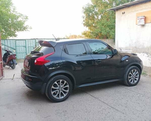 Черный Ниссан Жук, объемом двигателя 1.6 л и пробегом 160 тыс. км за 9300 $, фото 3 на Automoto.ua