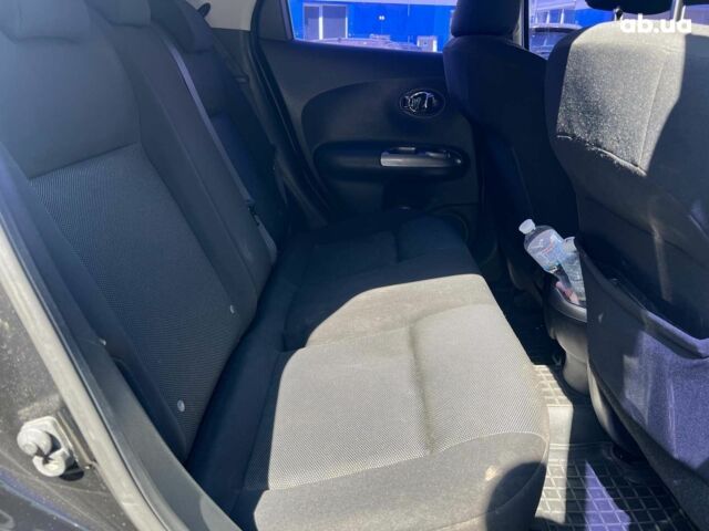 Черный Ниссан Жук, объемом двигателя 1.6 л и пробегом 115 тыс. км за 10030 $, фото 18 на Automoto.ua