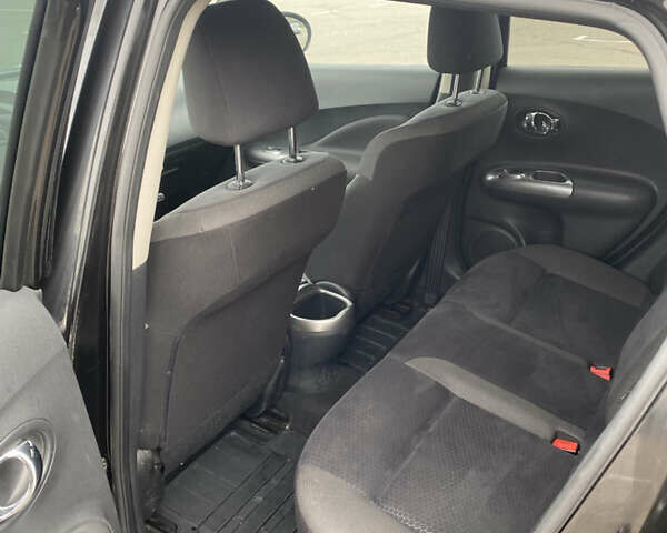 Черный Ниссан Жук, объемом двигателя 1.6 л и пробегом 120 тыс. км за 8300 $, фото 7 на Automoto.ua