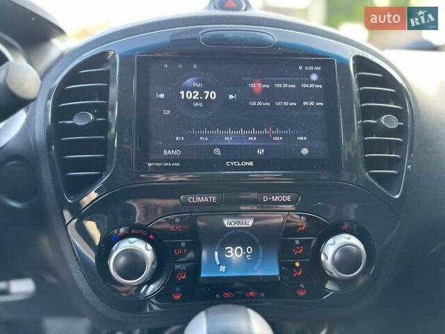 Черный Ниссан Жук, объемом двигателя 1.6 л и пробегом 117 тыс. км за 9900 $, фото 44 на Automoto.ua