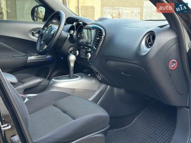 Черный Ниссан Жук, объемом двигателя 1.6 л и пробегом 117 тыс. км за 9900 $, фото 30 на Automoto.ua