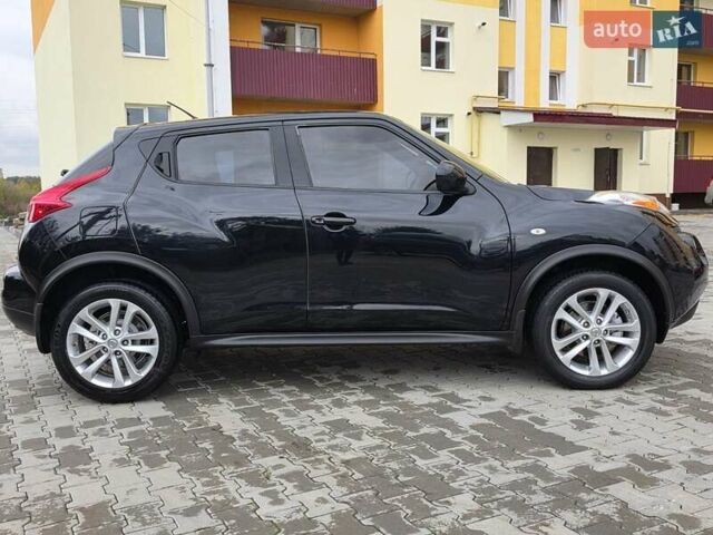 Черный Ниссан Жук, объемом двигателя 1.6 л и пробегом 105 тыс. км за 9499 $, фото 14 на Automoto.ua