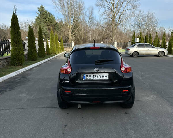 Черный Ниссан Жук, объемом двигателя 1.62 л и пробегом 216 тыс. км за 11000 $, фото 6 на Automoto.ua