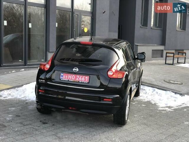 Черный Ниссан Жук, объемом двигателя 1.6 л и пробегом 155 тыс. км за 9990 $, фото 10 на Automoto.ua