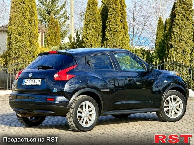 Черный Ниссан Жук, объемом двигателя 1.6 л и пробегом 270 тыс. км за 8800 $, фото 5 на Automoto.ua