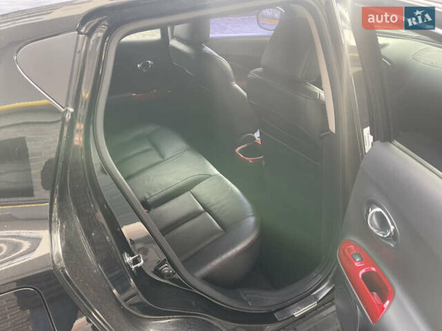 Черный Ниссан Жук, объемом двигателя 1.6 л и пробегом 159 тыс. км за 9500 $, фото 7 на Automoto.ua