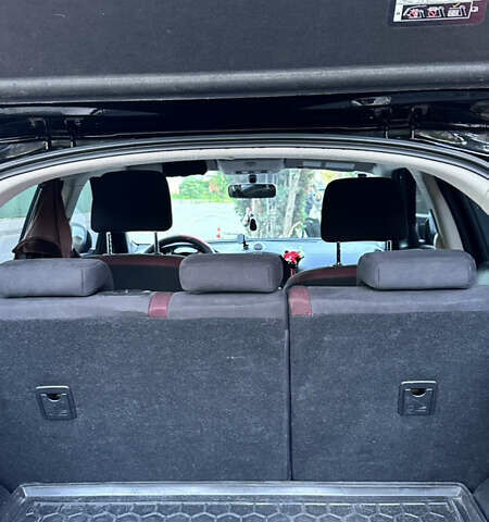 Черный Ниссан Жук, объемом двигателя 1.6 л и пробегом 102 тыс. км за 10999 $, фото 3 на Automoto.ua