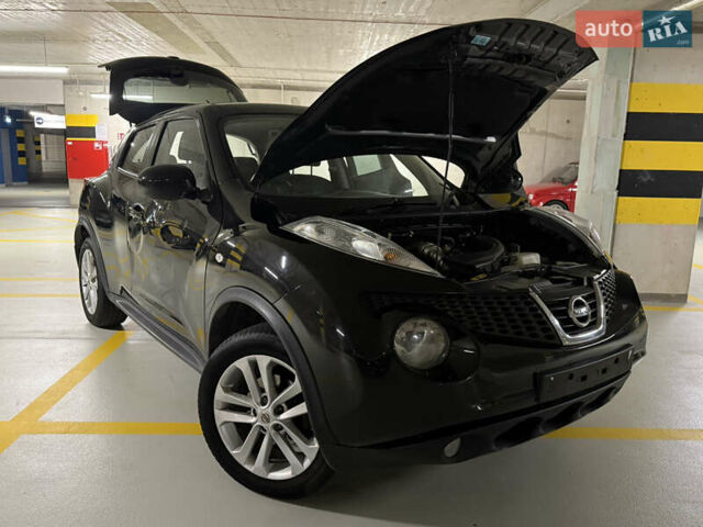 Черный Ниссан Жук, объемом двигателя 1.5 л и пробегом 250 тыс. км за 3950 $, фото 1 на Automoto.ua