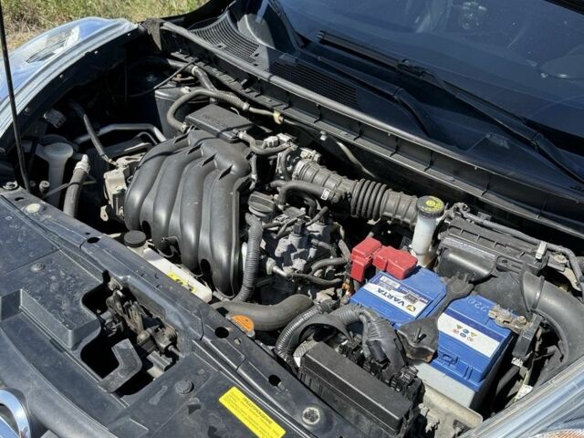 Черный Ниссан Жук, объемом двигателя 1.6 л и пробегом 128 тыс. км за 8800 $, фото 6 на Automoto.ua