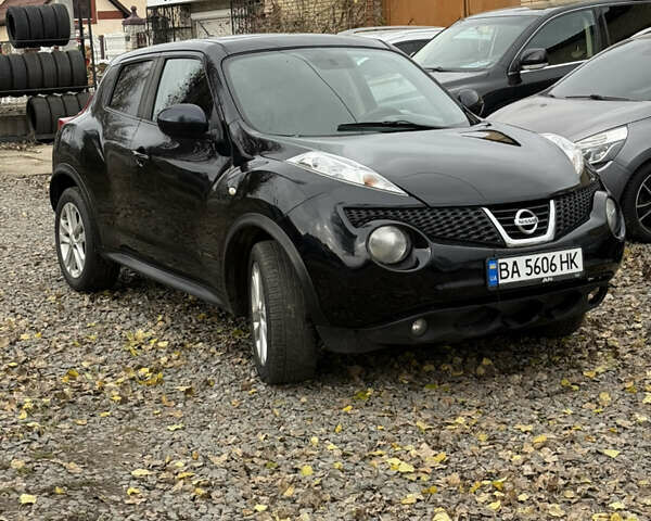 Черный Ниссан Жук, объемом двигателя 1.6 л и пробегом 118 тыс. км за 9600 $, фото 1 на Automoto.ua