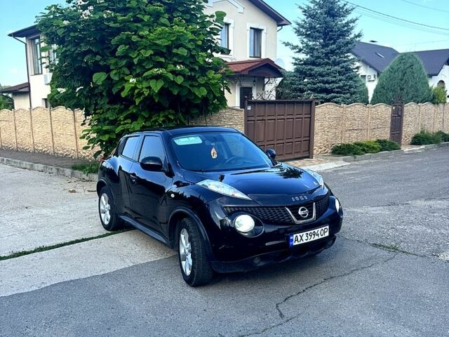 Чорний Ніссан Жук, об'ємом двигуна 1.6 л та пробігом 195 тис. км за 7500 $, фото 2 на Automoto.ua