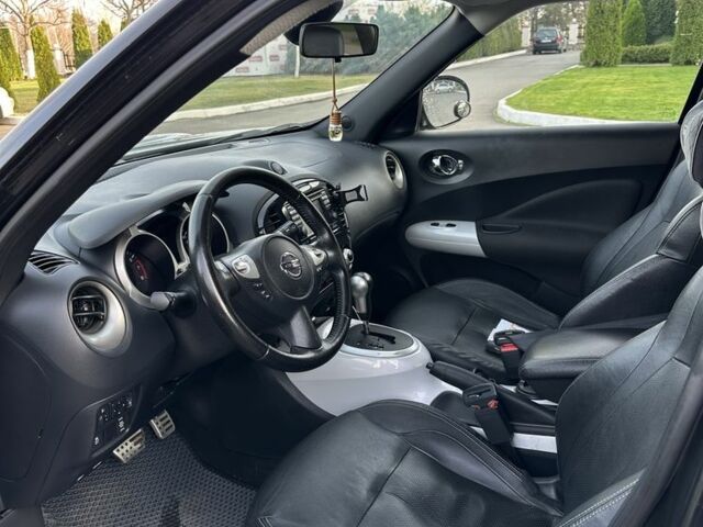 Чорний Ніссан Жук, об'ємом двигуна 1.6 л та пробігом 216 тис. км за 11000 $, фото 9 на Automoto.ua