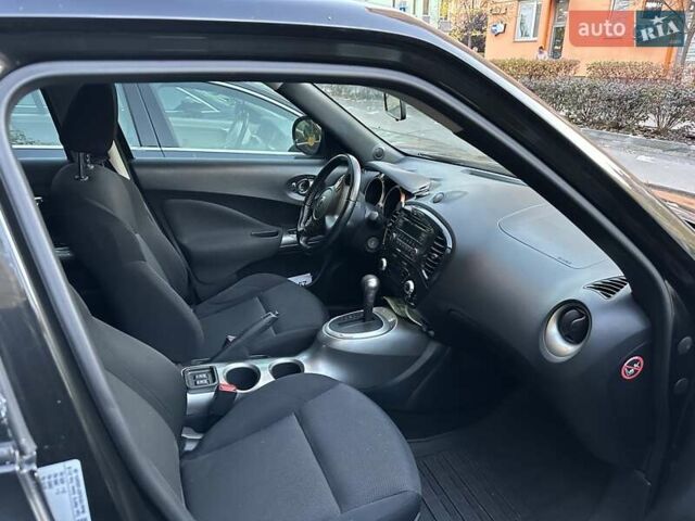 Черный Ниссан Жук, объемом двигателя 1.6 л и пробегом 103 тыс. км за 9700 $, фото 7 на Automoto.ua