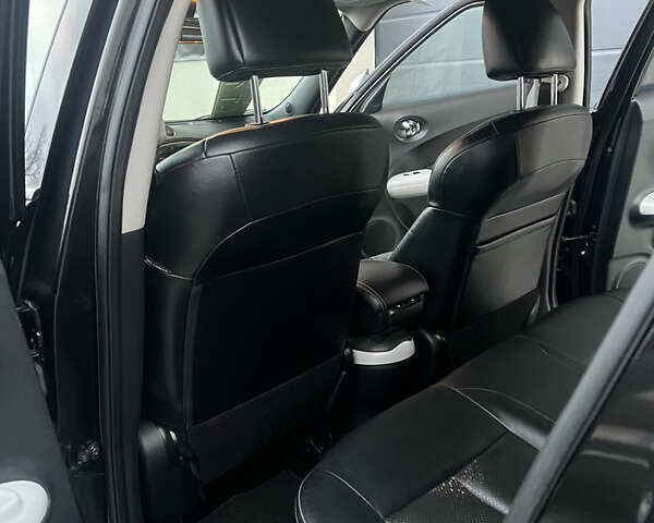 Черный Ниссан Жук, объемом двигателя 1.6 л и пробегом 190 тыс. км за 10850 $, фото 27 на Automoto.ua