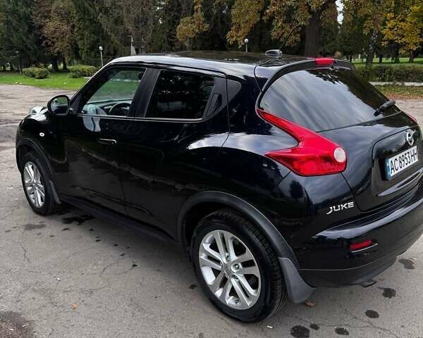 Черный Ниссан Жук, объемом двигателя 1.6 л и пробегом 197 тыс. км за 10500 $, фото 12 на Automoto.ua