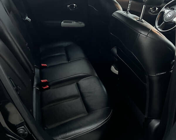 Черный Ниссан Жук, объемом двигателя 1.6 л и пробегом 190 тыс. км за 10850 $, фото 21 на Automoto.ua