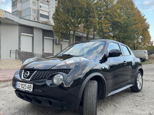 Черный Ниссан Жук, объемом двигателя 1.6 л и пробегом 112 тыс. км за 9200 $, фото 7 на Automoto.ua