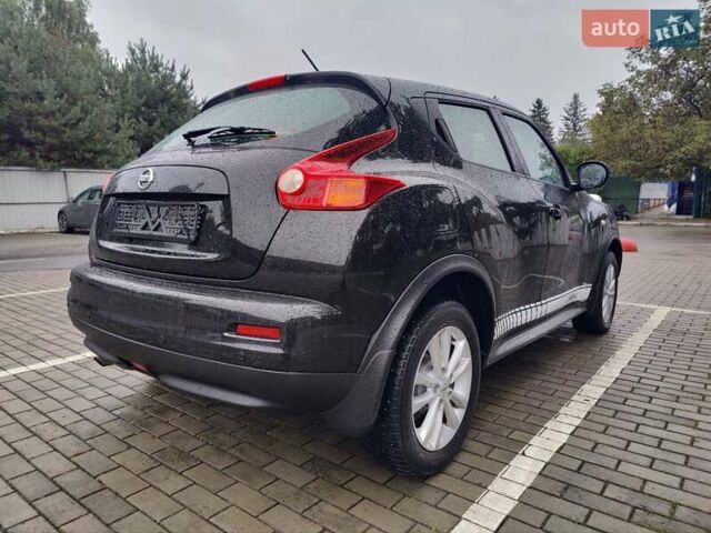 Черный Ниссан Жук, объемом двигателя 1.6 л и пробегом 237 тыс. км за 10900 $, фото 9 на Automoto.ua