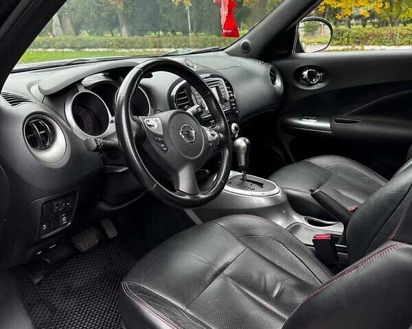 Черный Ниссан Жук, объемом двигателя 1.6 л и пробегом 197 тыс. км за 10500 $, фото 11 на Automoto.ua