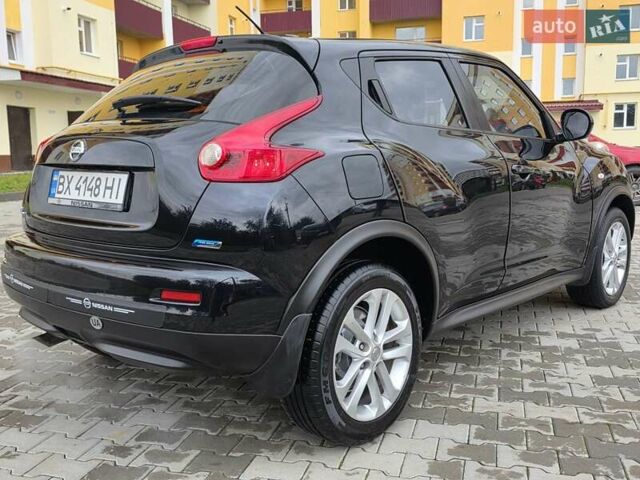 Черный Ниссан Жук, объемом двигателя 1.6 л и пробегом 105 тыс. км за 9499 $, фото 12 на Automoto.ua