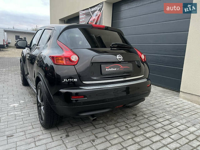 Черный Ниссан Жук, объемом двигателя 1.6 л и пробегом 190 тыс. км за 10850 $, фото 13 на Automoto.ua
