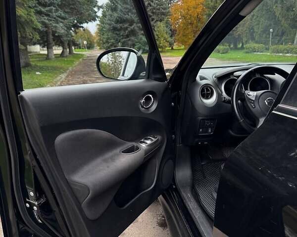 Черный Ниссан Жук, объемом двигателя 1.6 л и пробегом 197 тыс. км за 10500 $, фото 6 на Automoto.ua