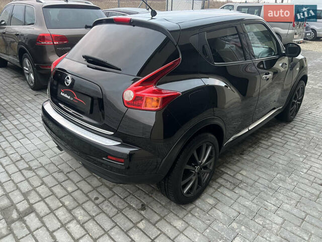 Черный Ниссан Жук, объемом двигателя 1.6 л и пробегом 190 тыс. км за 10850 $, фото 9 на Automoto.ua