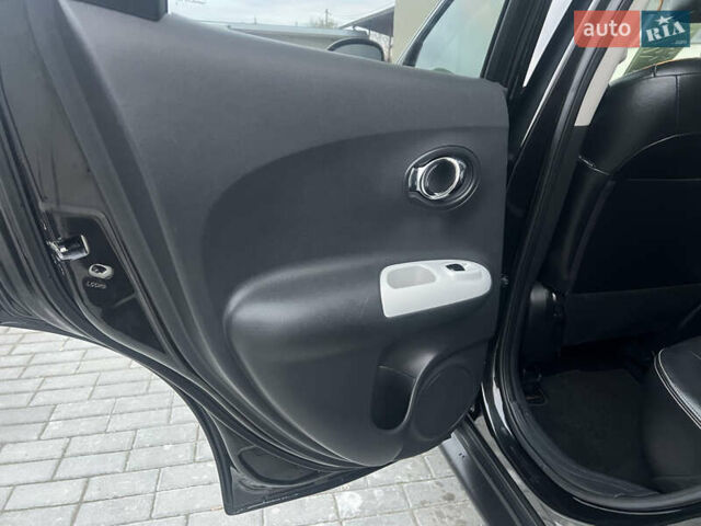 Черный Ниссан Жук, объемом двигателя 1.6 л и пробегом 190 тыс. км за 10850 $, фото 26 на Automoto.ua
