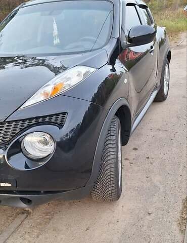 Черный Ниссан Жук, объемом двигателя 1.6 л и пробегом 170 тыс. км за 11000 $, фото 8 на Automoto.ua