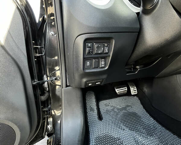 Черный Ниссан Жук, объемом двигателя 1.6 л и пробегом 115 тыс. км за 9900 $, фото 12 на Automoto.ua