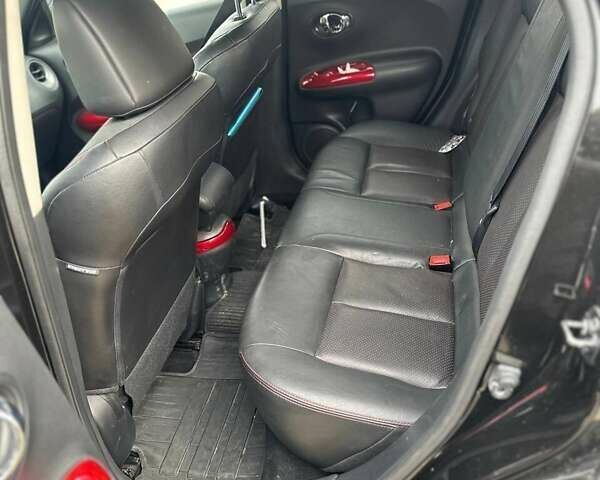 Черный Ниссан Жук, объемом двигателя 1.62 л и пробегом 78 тыс. км за 12000 $, фото 7 на Automoto.ua